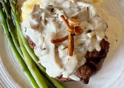 Londonderry dining special – 6oz filet mignon with a wild mushroom parmesan cream sauce topped with crispy roasted enoki mushrooms paired with a Chilean Malbec