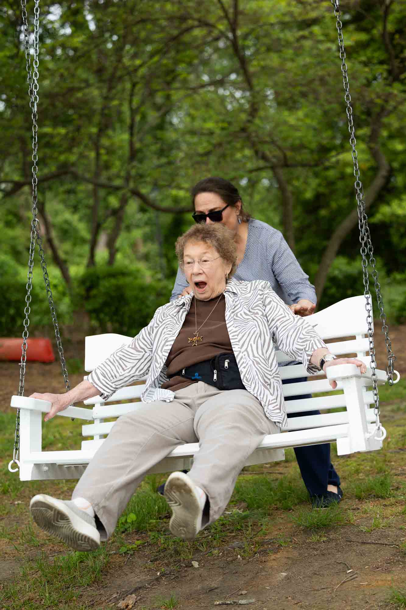 Londonderry Resident enjoying a swing on campus